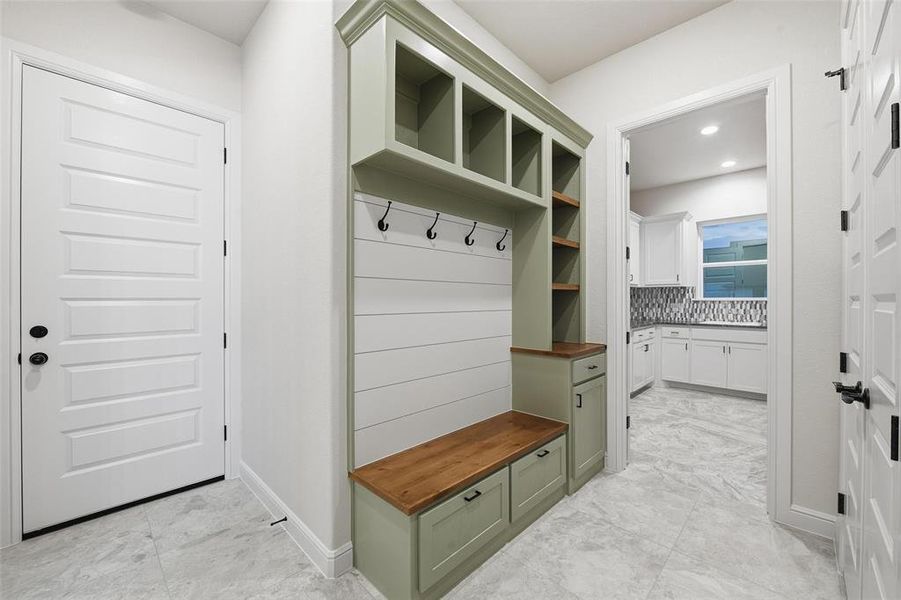 Mudroom with baseboards and recessed lighting Mudroom with baseboards and recessed lighting