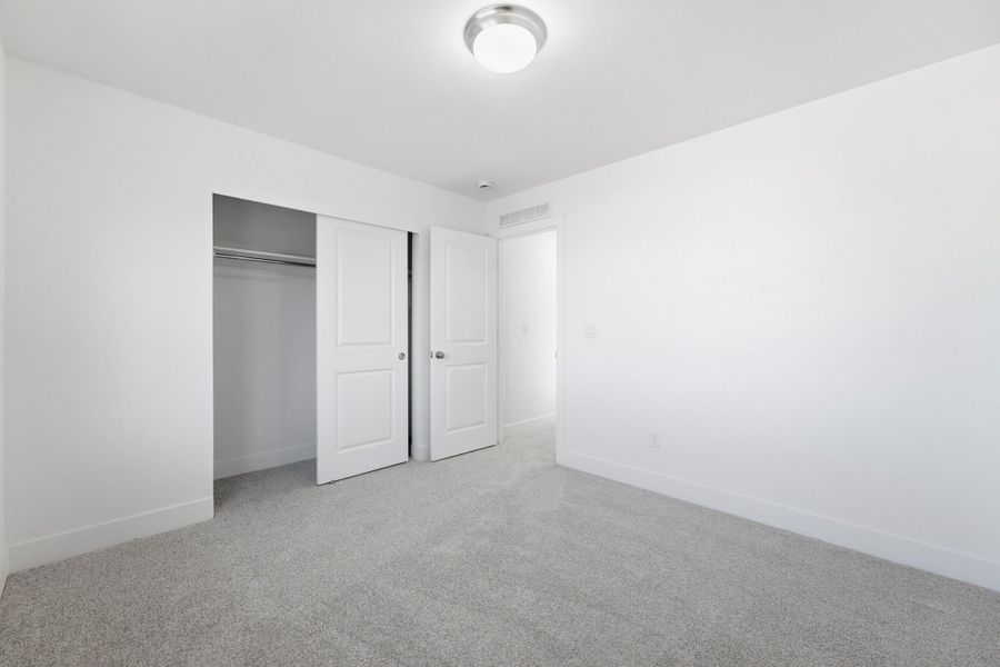 Spacious, unfurnished interior of a new home in Trailstone, Arvada (Image 19).