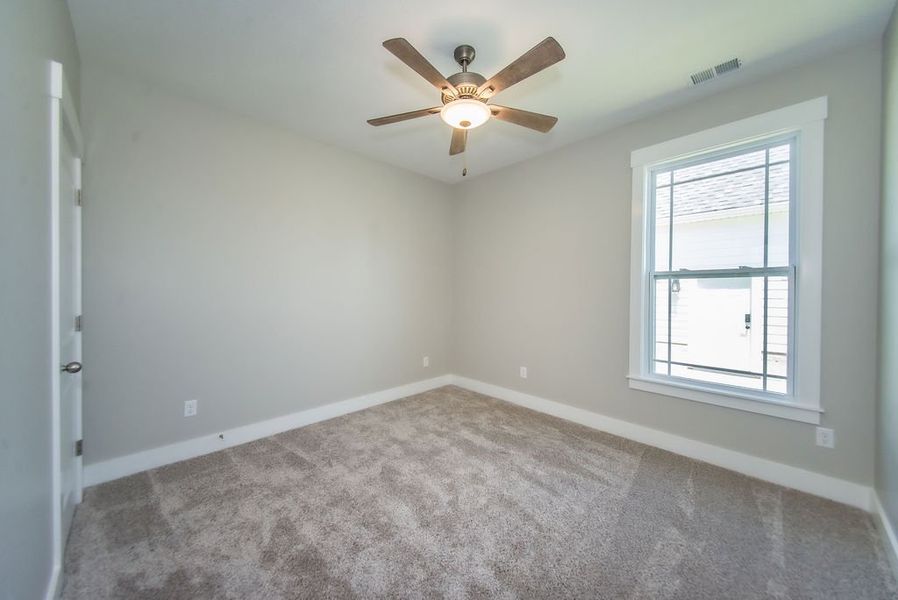Representative unfurnished interior of a home built from the Beaumont Elite by Enchanted Homes in Pointe Summit, Slater-Marietta (Image 27).