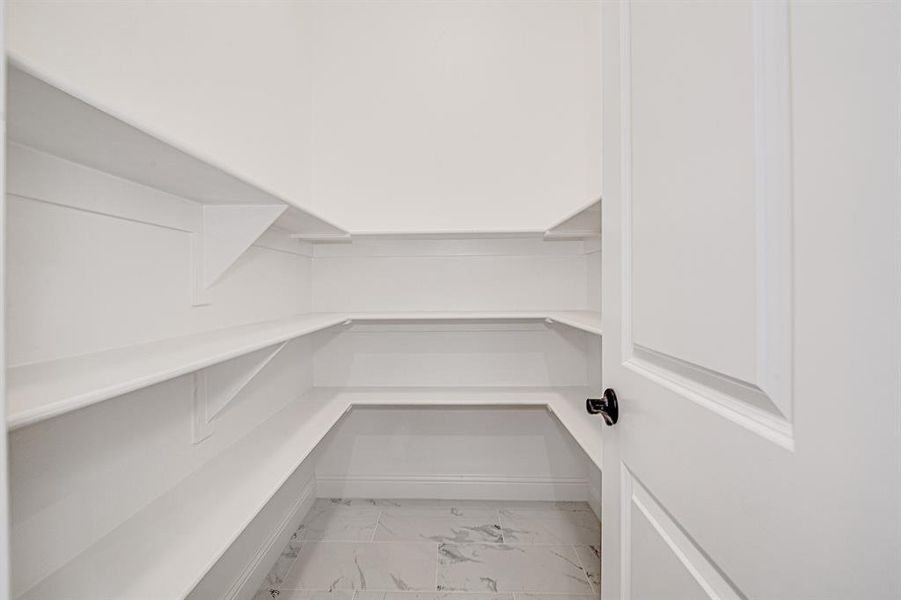 Walk in view of pantry