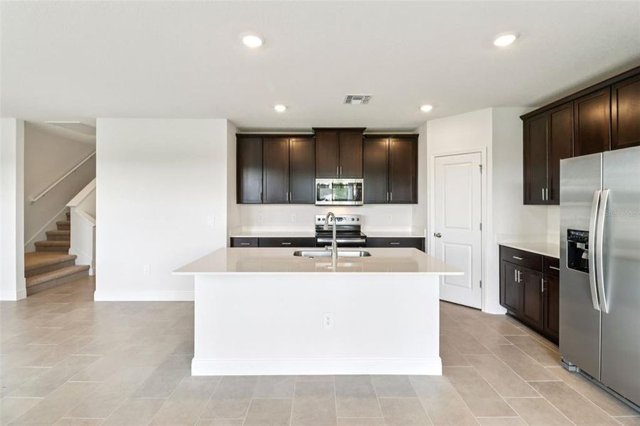 Furnished interior view inside a new home in The Reserve at Hammock Oaks - Classic Series, Lady Lake (Image 6).