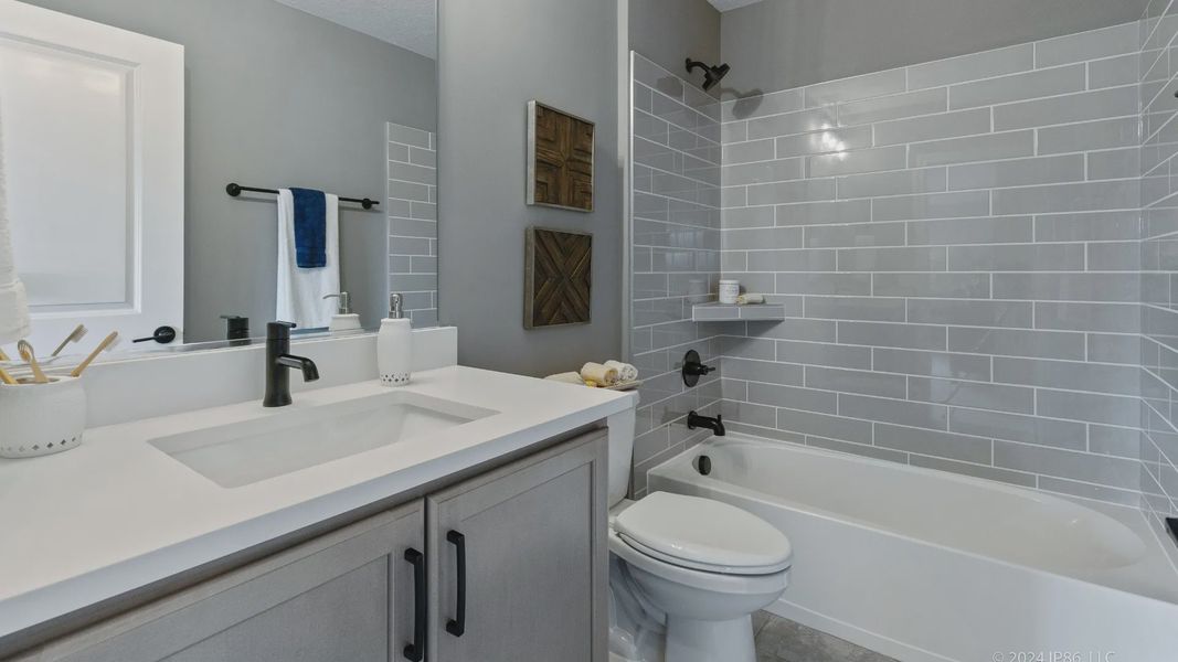 Representative furnished interior of a home built from the Cambridge by Epcon Communities in The Courtyards at Oak Grove, Durham (Image 35).