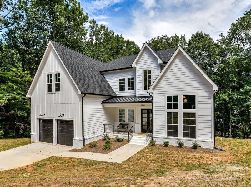 Front exterior of a new home in , Terrell, NC, highlighting curb appeal (Image 24).