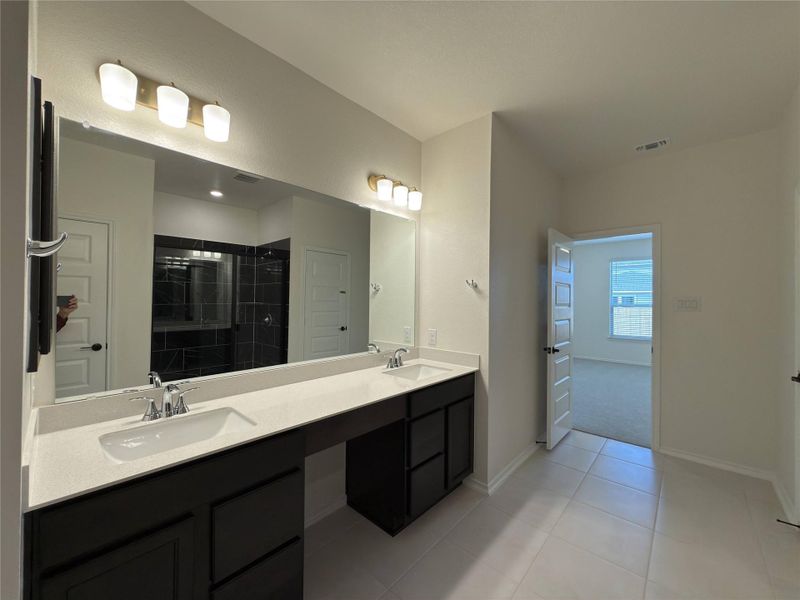 Furnished interior view inside a new home in River Bluff, Leander (Image 15).