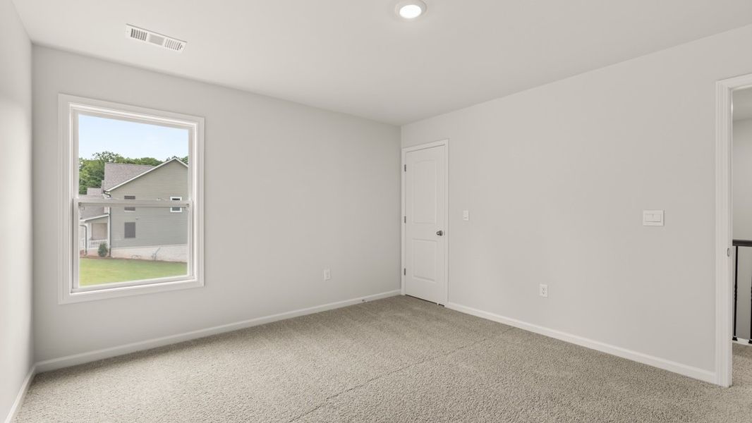 Representative unfurnished interior of a home built from the Bellview by D.R. Horton in Haven Abbey, Cumming (Image 28).