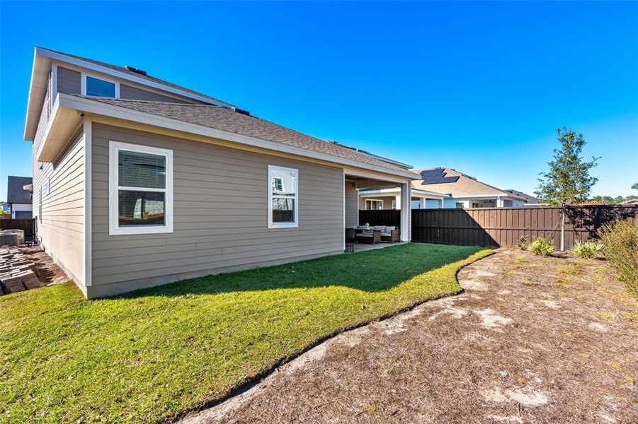 Exterior details and patio area of a home in Weslyn Park at Sunbridge, St. Cloud (Image 30).