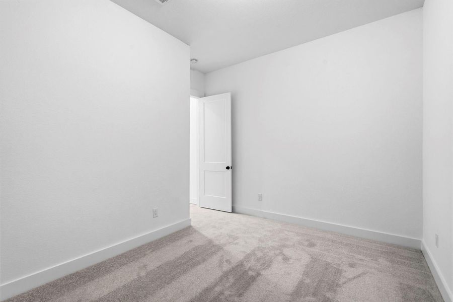 Spacious, unfurnished interior of a new home in Hunters Crossing, Sealy (Image 28).