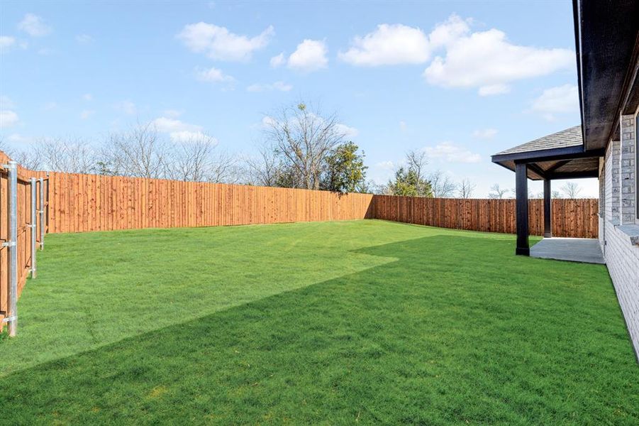 Exterior details and patio area of a home in Georgetown at Kings Fort, Kaufman (Image 28).