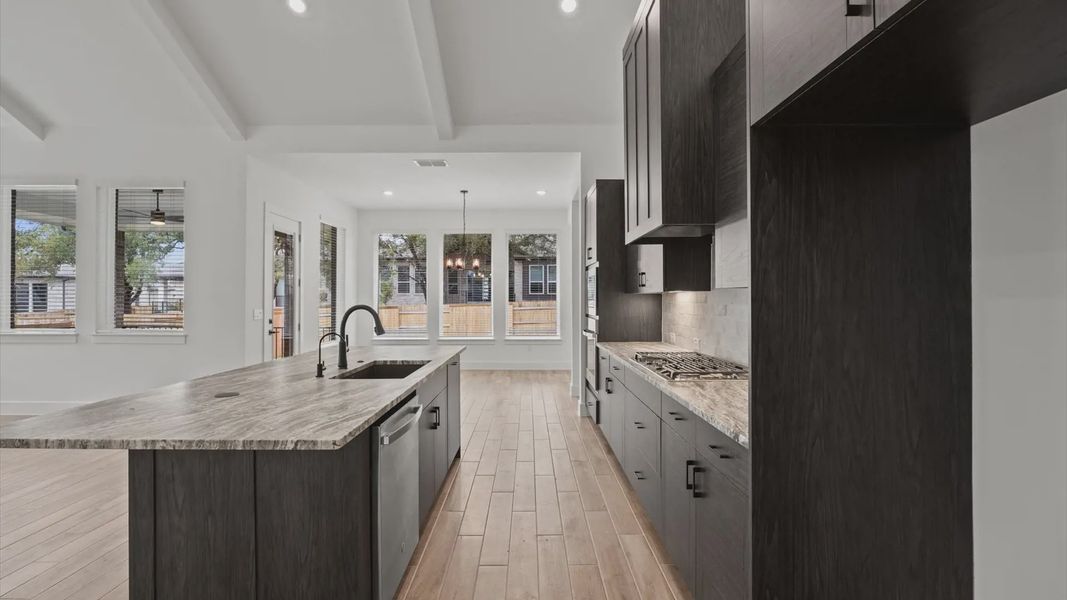 Furnished interior view inside a new home in 6 Creeks, Kyle (Image 6).