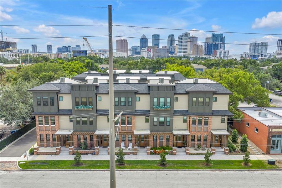 Front exterior of a new home in East Oak Townhomes, Tampa, FL, highlighting curb appeal (Image 24).