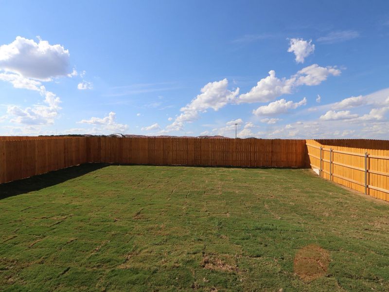 Exterior details and patio area of a home in Cascades at Onion Creek, Austin (Image 4).