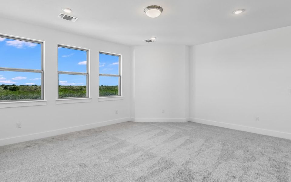Representative unfurnished interior of a home built from the Howard by Brookfield Residential in Traditional Homes at Easton Park, Austin (Image 12).
