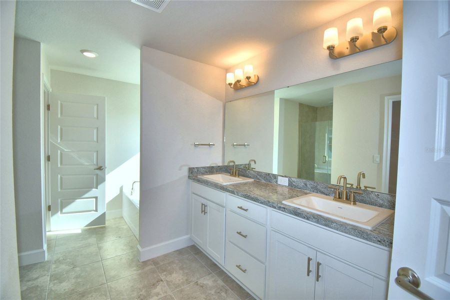 Furnished interior view inside a new home in Cadence Crossing, Auburndale (Image 10).