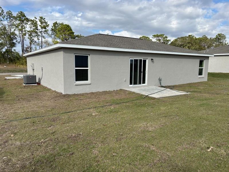 Exterior details and patio area of a home in , Citrus Springs (Image 4).