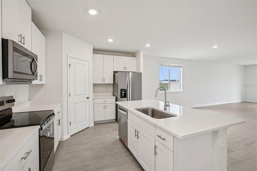 Furnished interior view inside a new home in Two Rivers - Classic Series, Zephyrhills (Image 6).