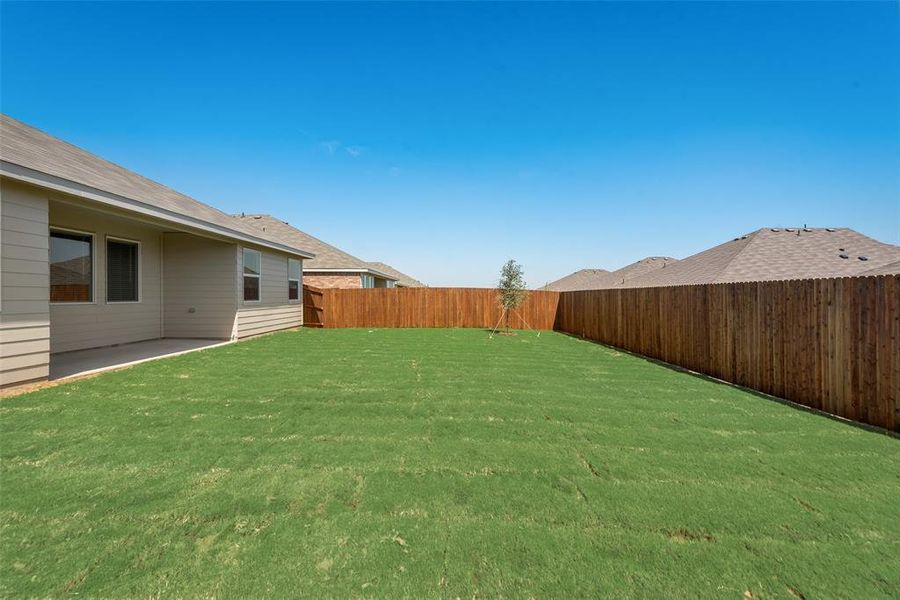 View of yard with a patio