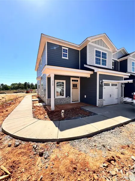 Rear load garage and entrance