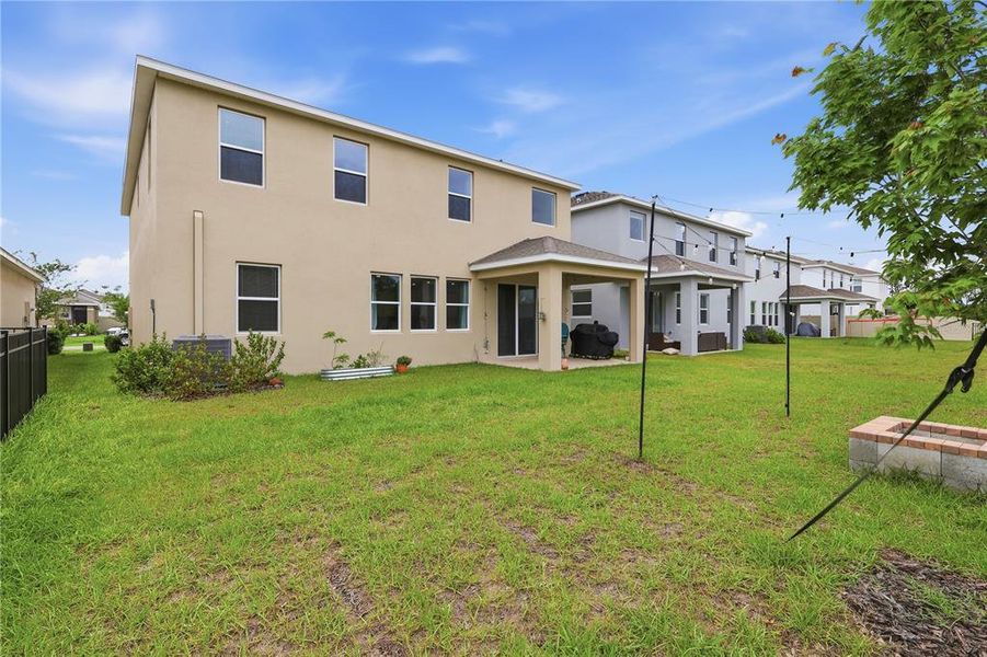 Exterior details and patio area of a home in Deerbrook, Land O' Lakes (Image 3).