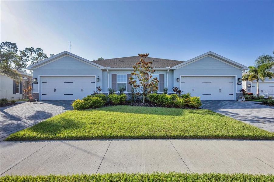 Front exterior of a new home in , Port Charlotte, FL, highlighting curb appeal (Image 21). Front exterior of a new home in , Port Charlotte, FL, highlighting curb appeal (Image 21).