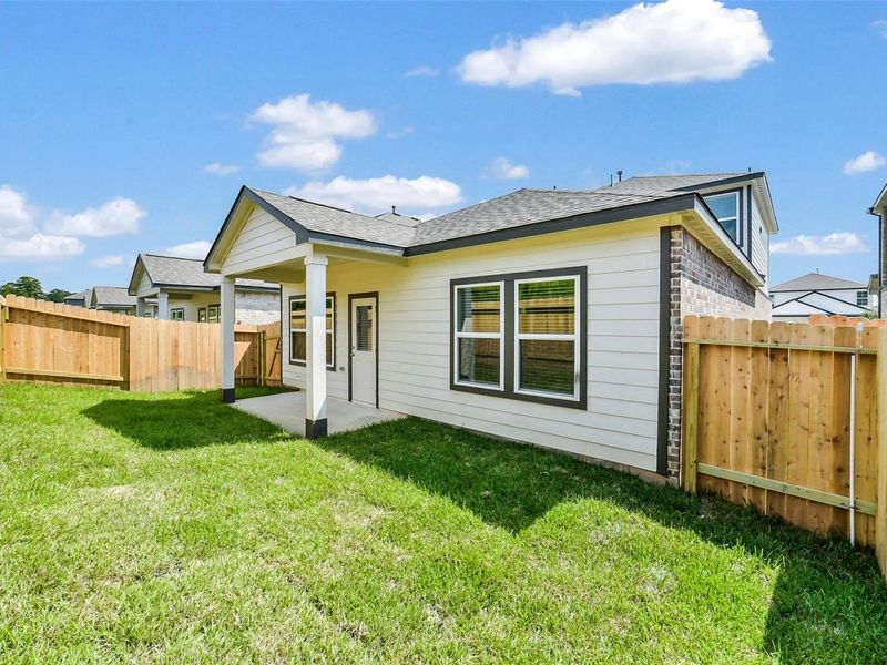 Exterior details and patio area of a home in Lakes at Black Oak, Magnolia (Image 24). Exterior details and patio area of a home in Lakes at Black Oak, Magnolia (Image 24).