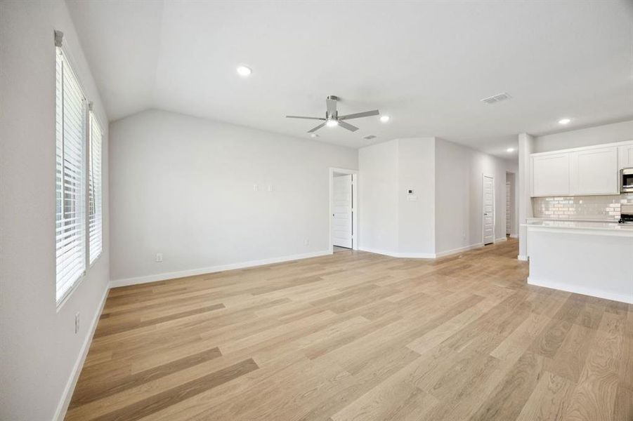 Open Floor Plan in the Emmy II home plan by Trophy Signature Homes - REPRESENTATIVE PHOTO