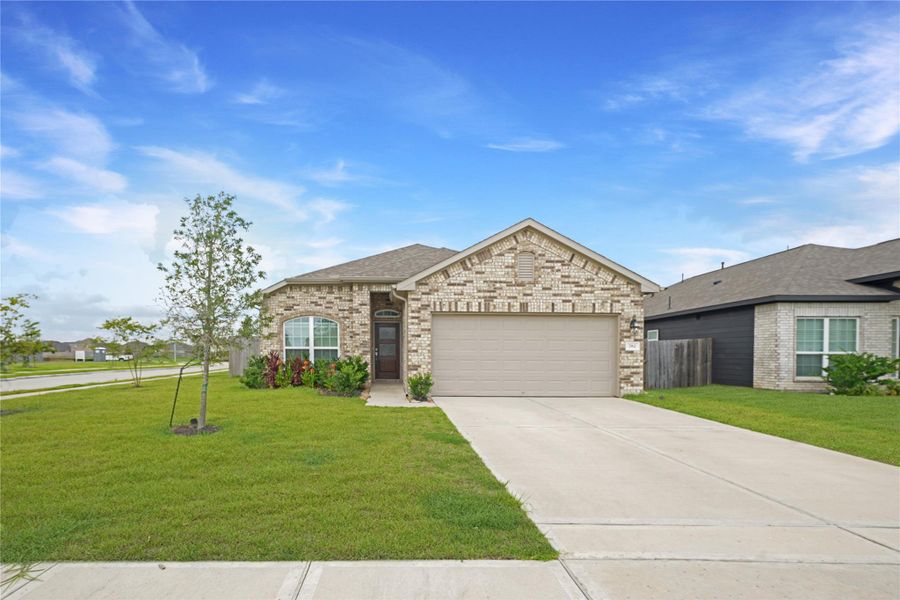 Front exterior of a new home in , La Marque, TX, highlighting curb appeal (Image 1). Front exterior of a new home in , La Marque, TX, highlighting curb appeal (Image 1).