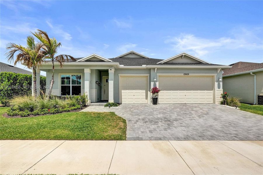 Front exterior of a new home in , Port St. Lucie, FL, highlighting curb appeal (Image 24). Front exterior of a new home in , Port St. Lucie, FL, highlighting curb appeal (Image 24).