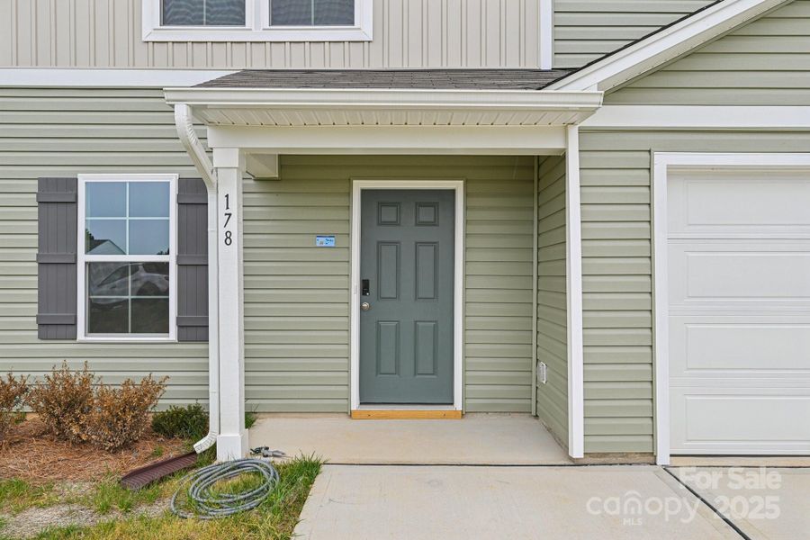 Exterior details and patio area of a home in The Pines at Stoney Point, Lexington (Image 3).