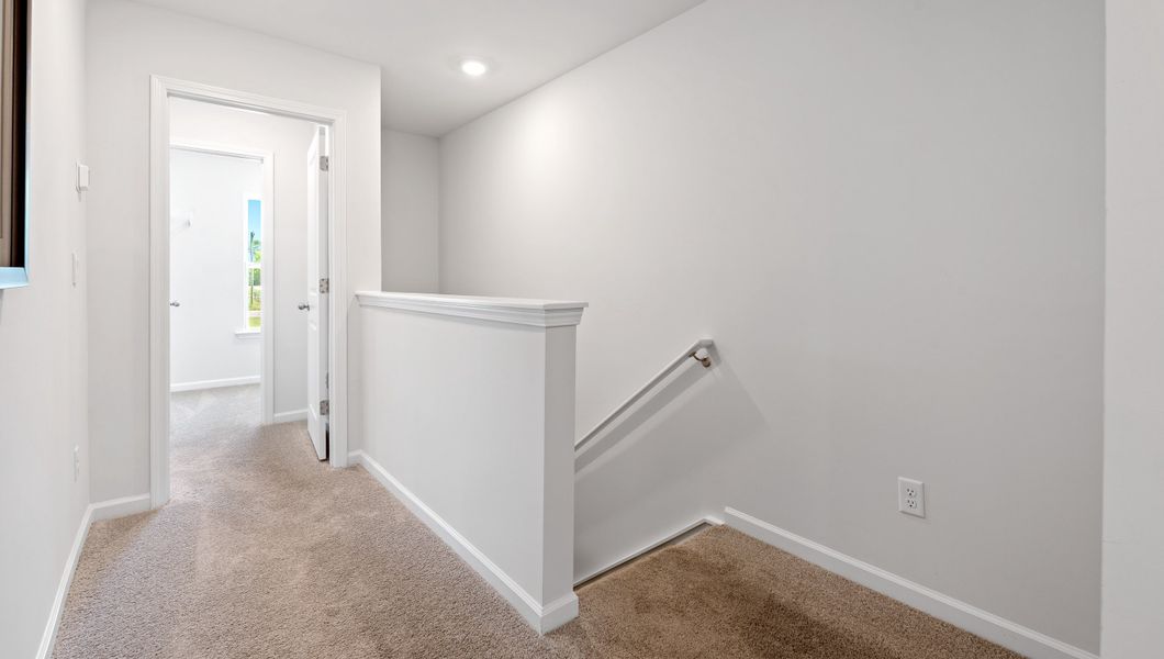 Spacious, unfurnished interior of a new home in Tanglewood Townes, Greenville (Image 22).