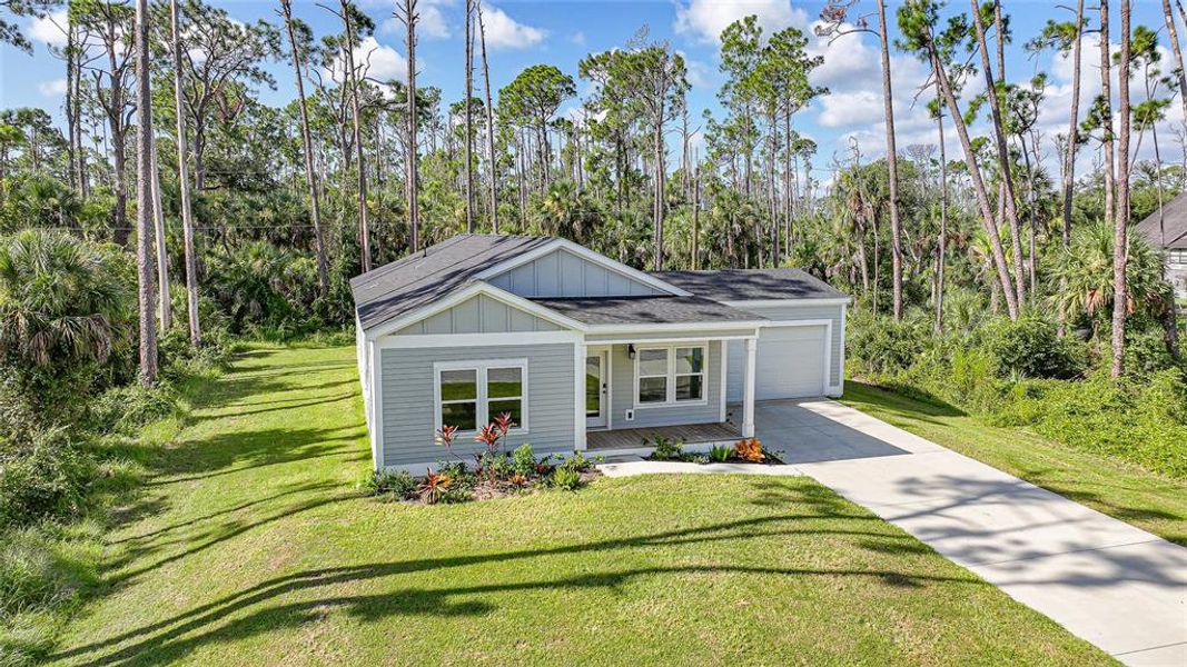 Front exterior of a new home in , Port Charlotte, FL, highlighting curb appeal (Image 17).