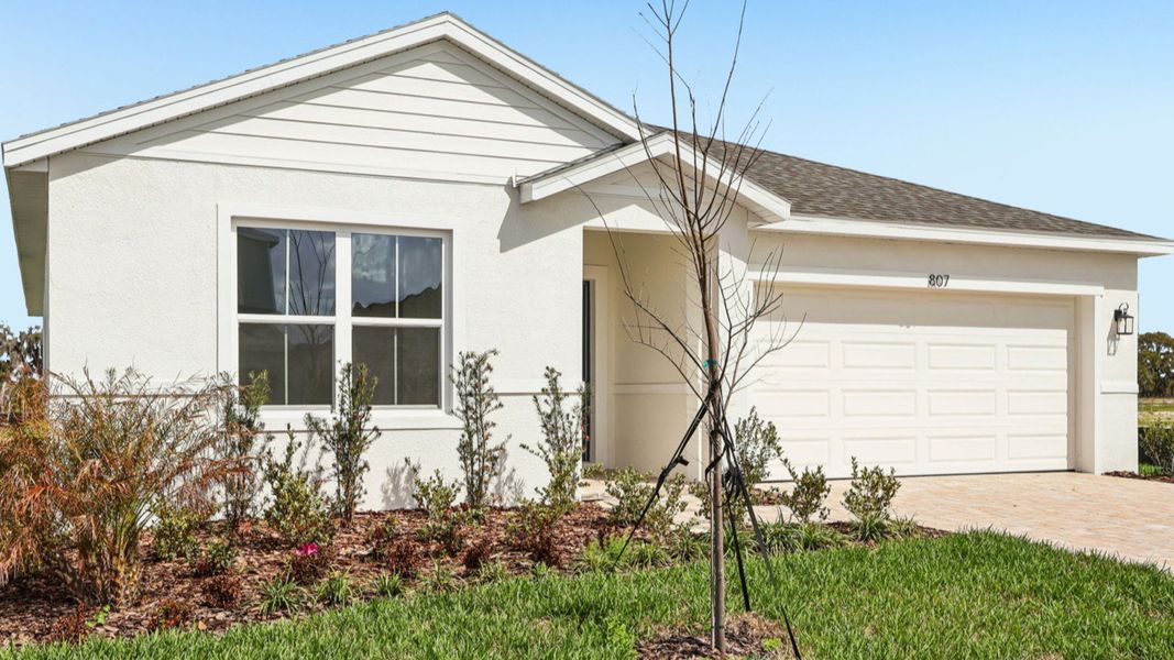 Representative exterior photo of a completed home built from the Baker by DRB Homes in Liberty Trace, Haines City, FL (Image 22).