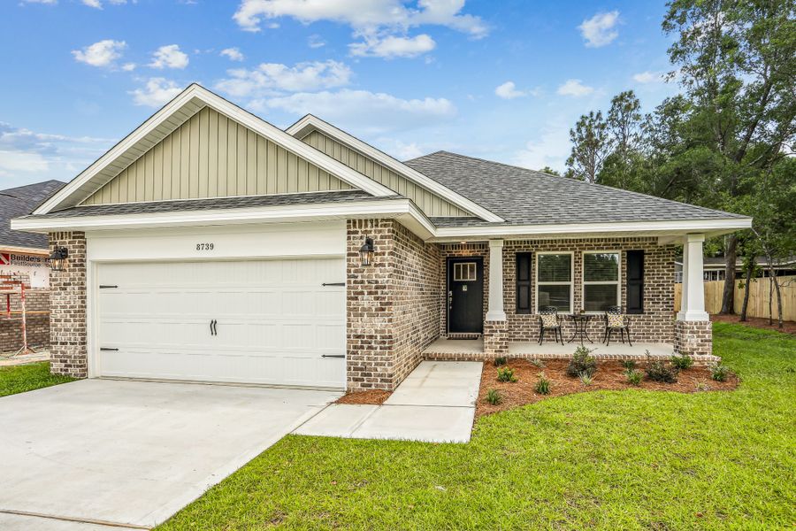 Representative exterior photo of a completed home built from the The Carlos by Herbst Homes in Doyle Hawkins Landing, Navarre, FL (Image 37).