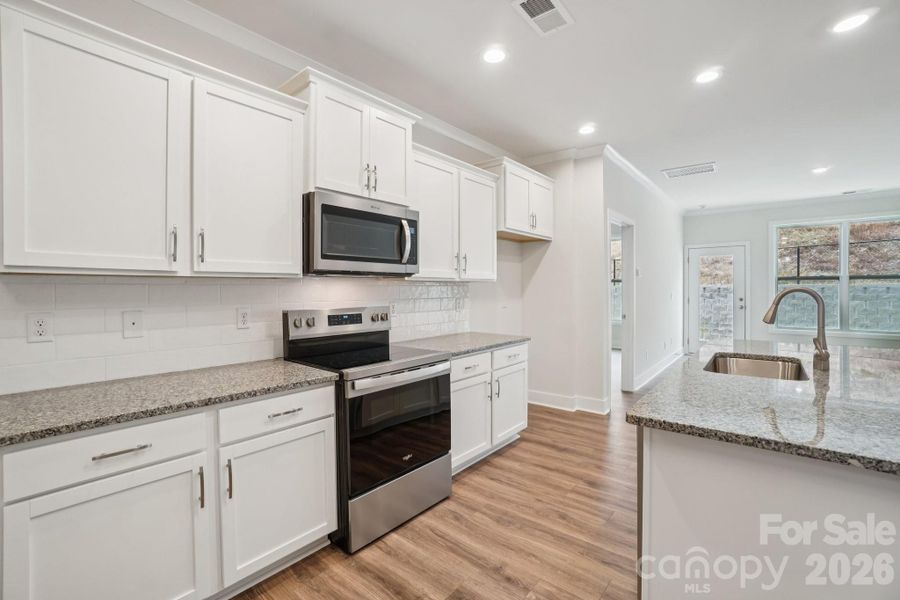 Furnished interior view inside a new home in , Weaverville (Image 7).