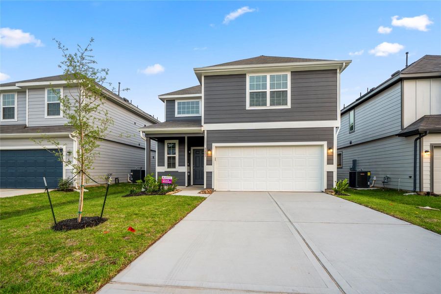 Front exterior of a new home in , Conroe, TX, highlighting curb appeal (Image 24). Front exterior of a new home in , Conroe, TX, highlighting curb appeal (Image 24).