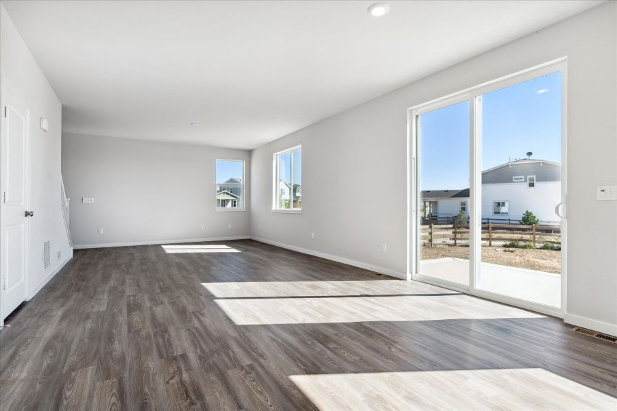 A room with a wood floor and a wood floor with a wood floor.