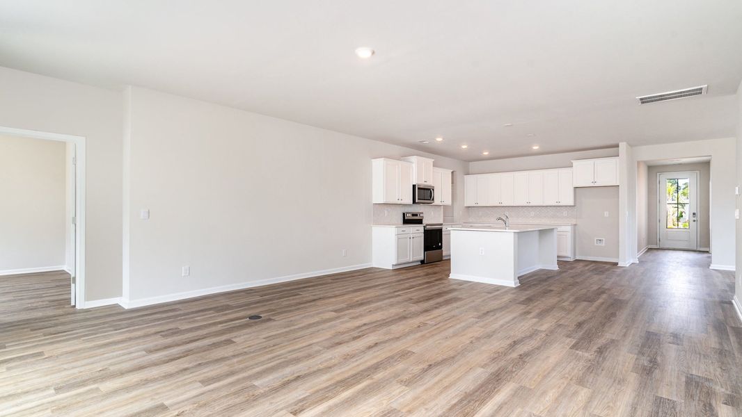 Representative unfurnished interior of a home built from the TRIVECTA by D.R. Horton in Shell Pointe, Gilbert (Image 11).