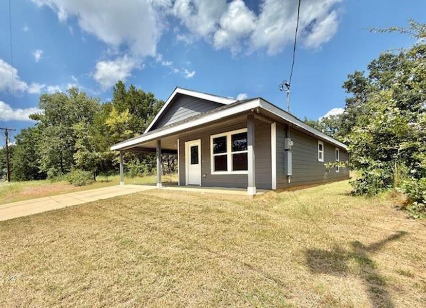 Front exterior of a new home in , Mabank, TX, highlighting curb appeal (Image 2). Front exterior of a new home in , Mabank, TX, highlighting curb appeal (Image 2).