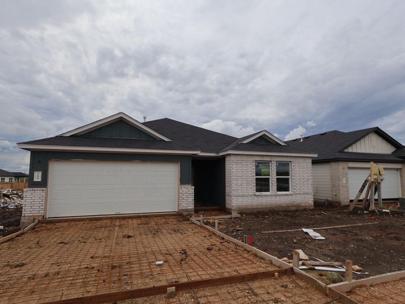 In-progress construction of a new home in Willow Springs, Buda, TX (Image 11).