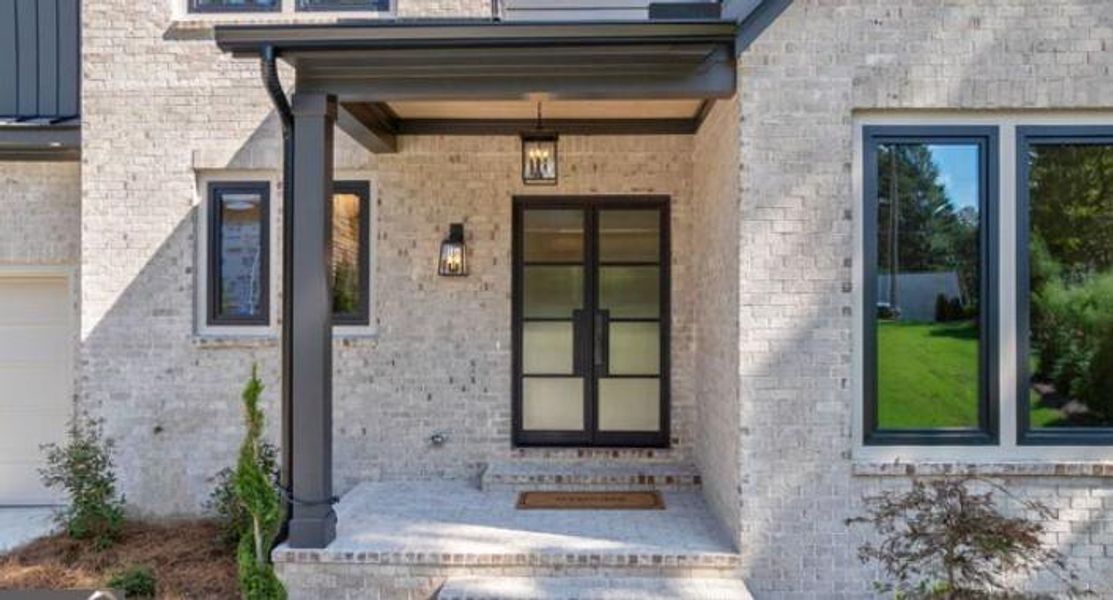 Front exterior of a new home in , Cumming, GA, highlighting curb appeal (Image 29). Front exterior of a new home in , Cumming, GA, highlighting curb appeal (Image 29).