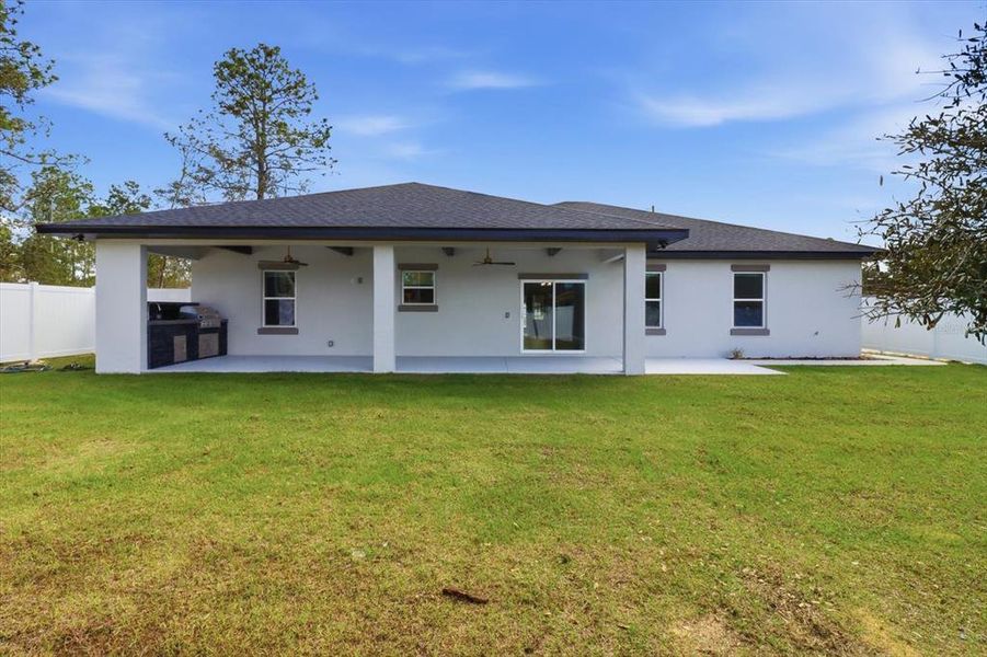 Exterior details and patio area of a home in , Citrus Springs (Image 23).