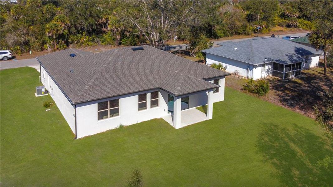 Exterior details and patio area of a home in , North Port (Image 16).
