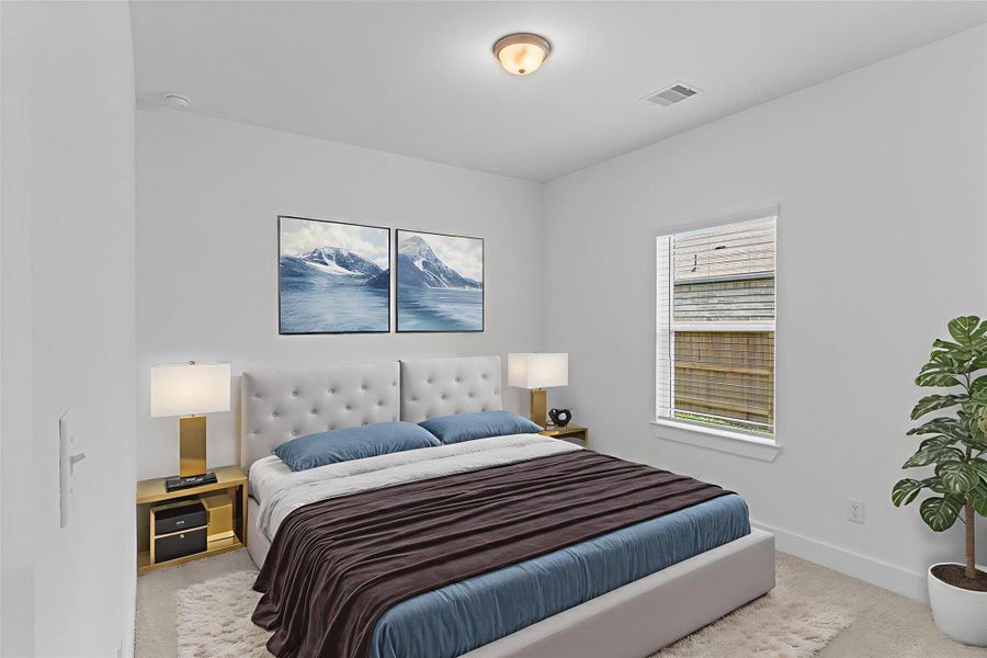Another spacious bedroom filled with natural light and soft neutral tones that make it easy to decorate. It’s a comfortable space for rest, work, or play. *Virtually Stage Photo*