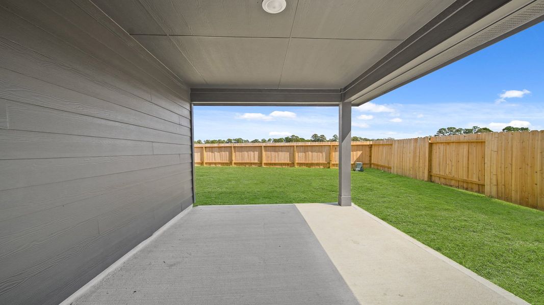 Exterior details and patio area of a home in Grand Pines, Magnolia (Image 3). Exterior details and patio area of a home in Grand Pines, Magnolia (Image 3).