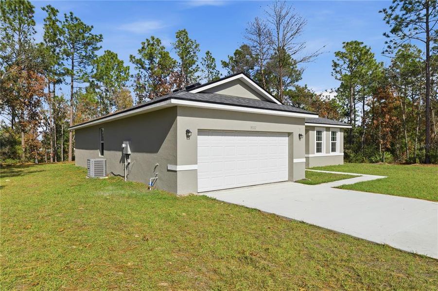 Front exterior of a new home in , Ocala, FL, highlighting curb appeal (Image 17).