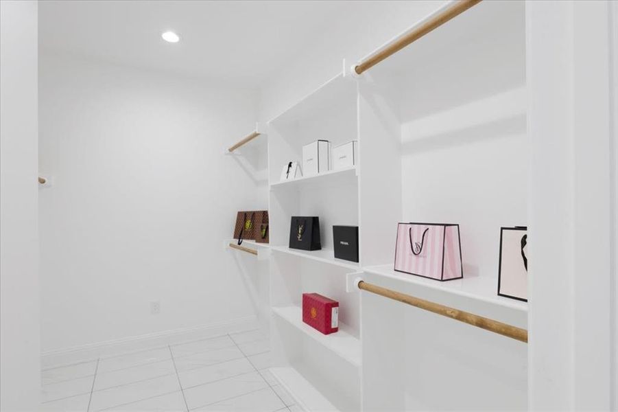 Bathroom with baseboards and recessed lighting