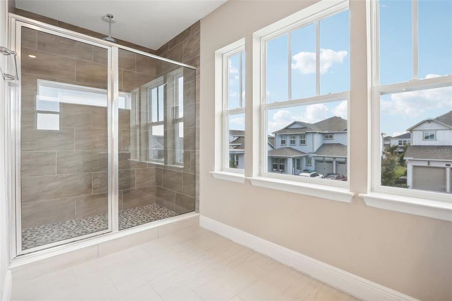 Spacious, unfurnished interior of a new home in Laureate Park, Orlando (Image 39).