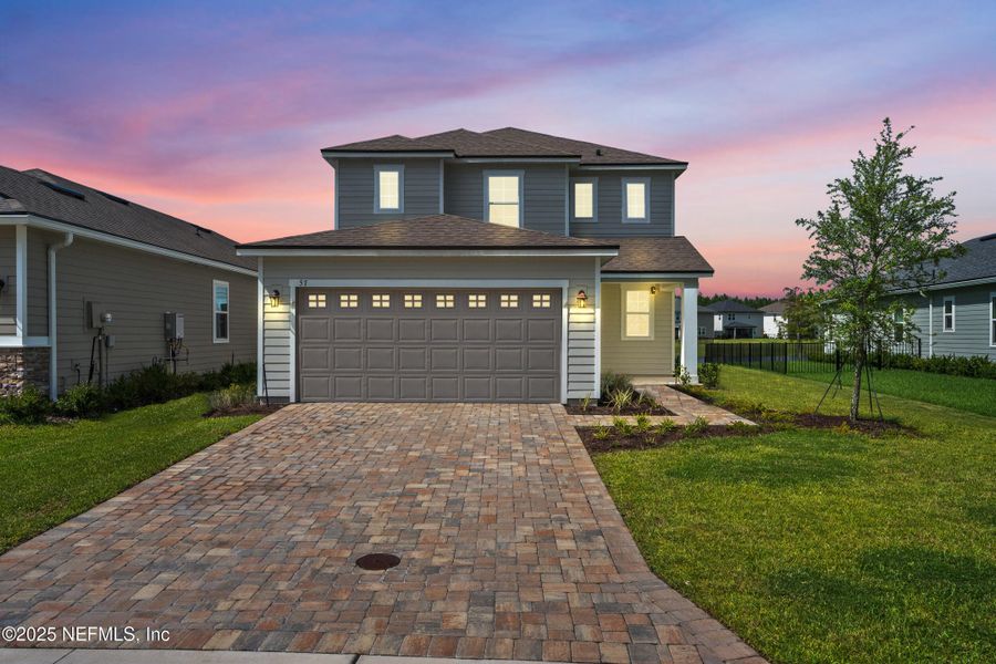 Front exterior of a new home in , St. Augustine, FL, highlighting curb appeal (Image 24).