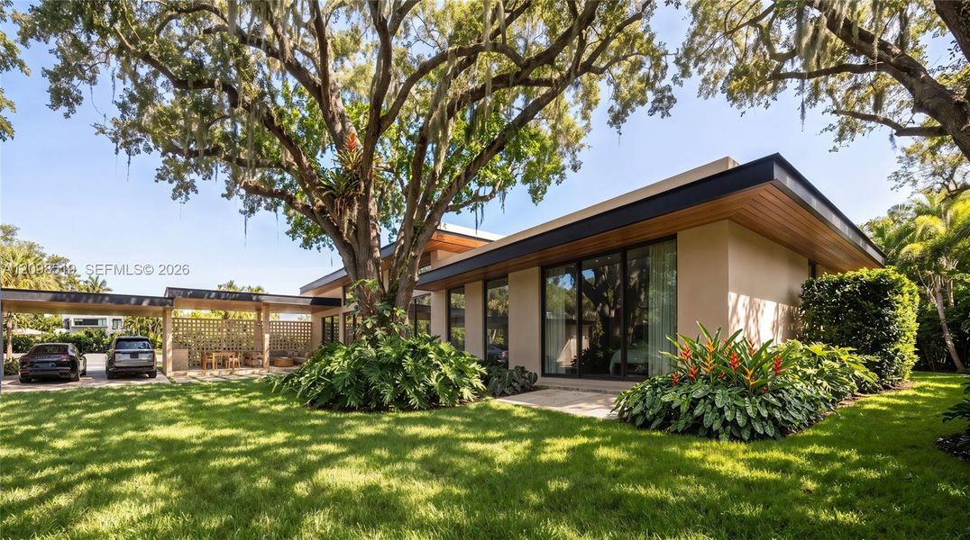 Exterior details and patio area of a home in , North Miami (Image 3).