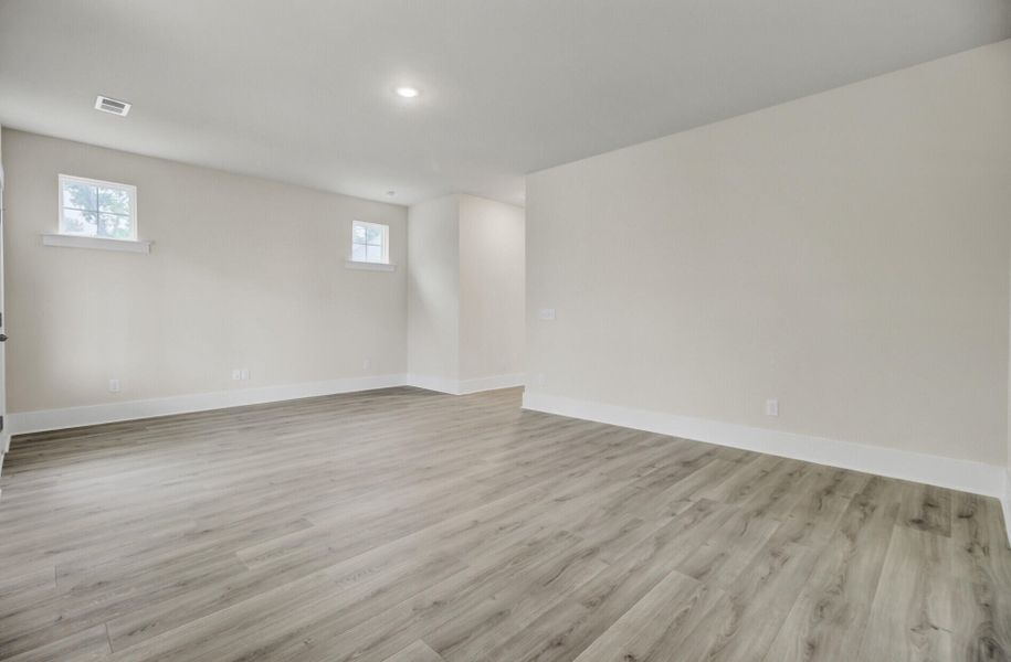 Spacious, unfurnished interior of a new home in Indigo Grove Single Family Homes, Johns Island (Image 52).
