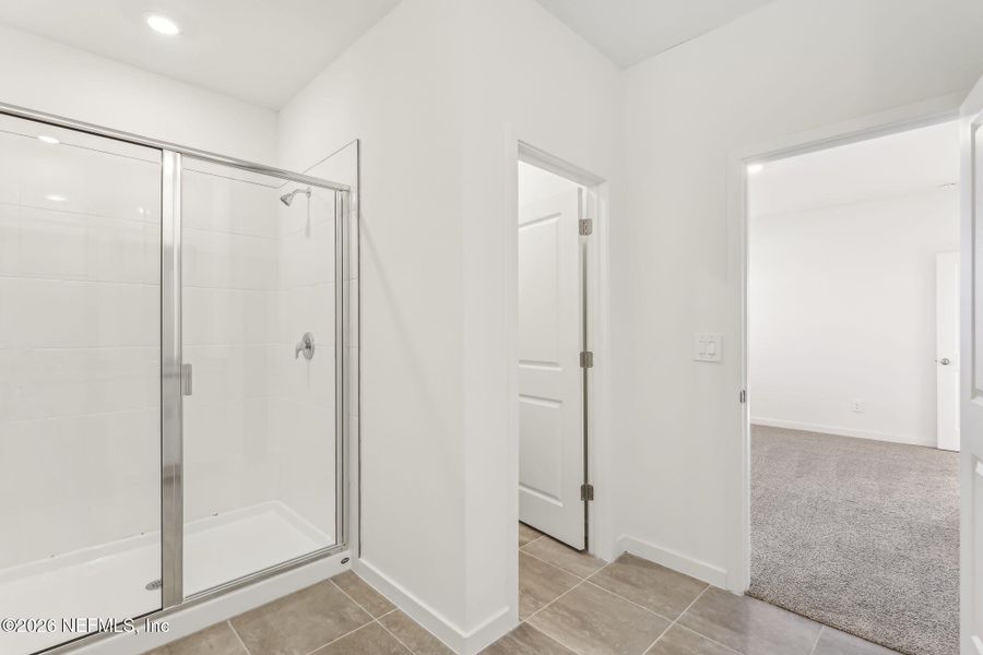 Spacious, unfurnished interior of a new home in Lakes at Bella Lago - Signature Series, Green Cove Springs (Image 27). Spacious, unfurnished interior of a new home in Lakes at Bella Lago - Signature Series, Green Cove Springs (Image 27).